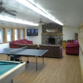 couches, ping pong table and pool table