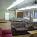 couches, ping pong table and pool table